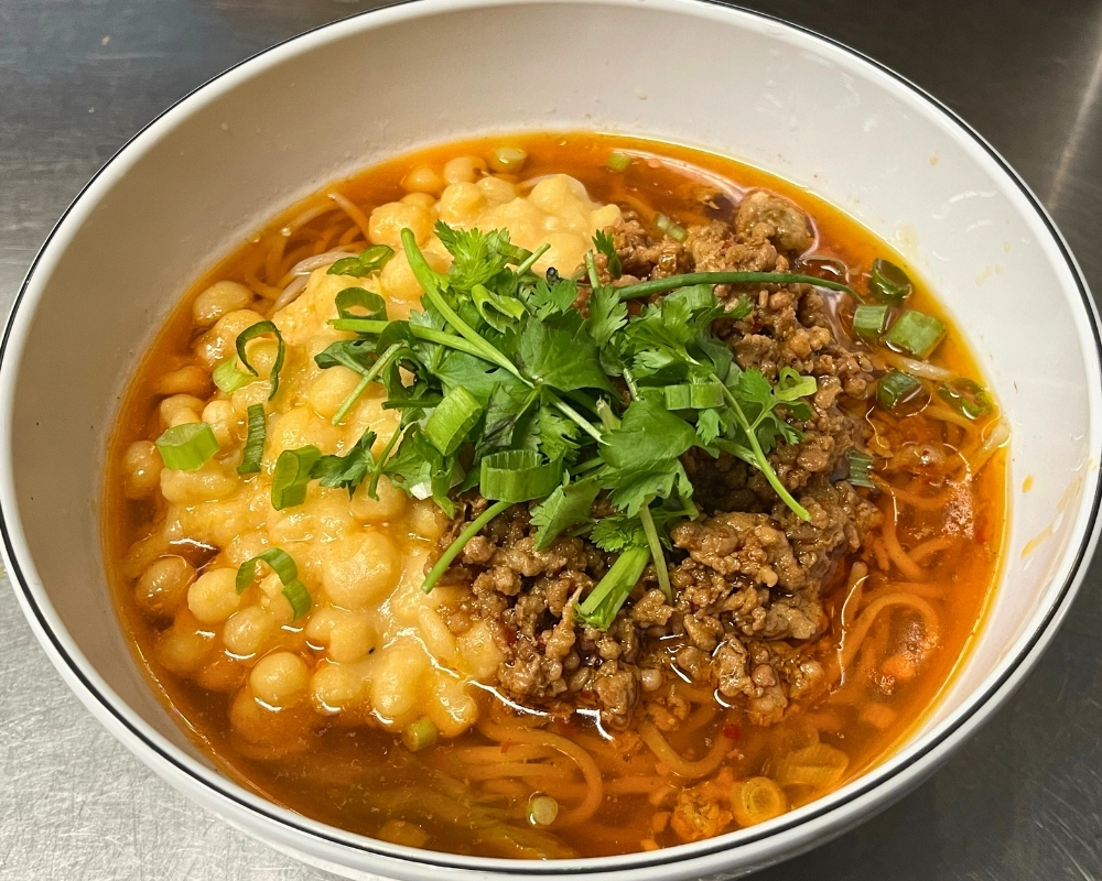 Pea and minced pork noodle soup at Cal's Noodle Hut, a Chinese Noodle Restaurant in Calgary