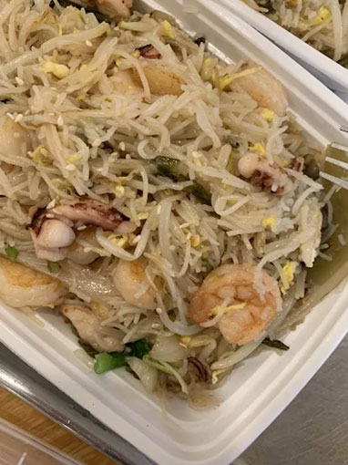 Seafood rice noodles with shrimp, squid, bean sprouts, and egg at Canto House, a Chinese restaurant in Philadelphia