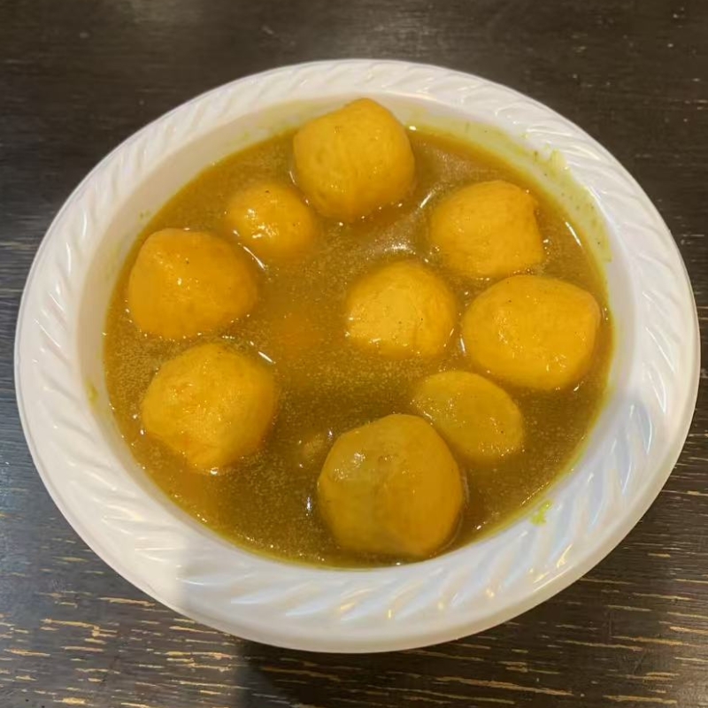 Fish balls in fragrant curry sauce. a Chinese Restaurant in Oneida.