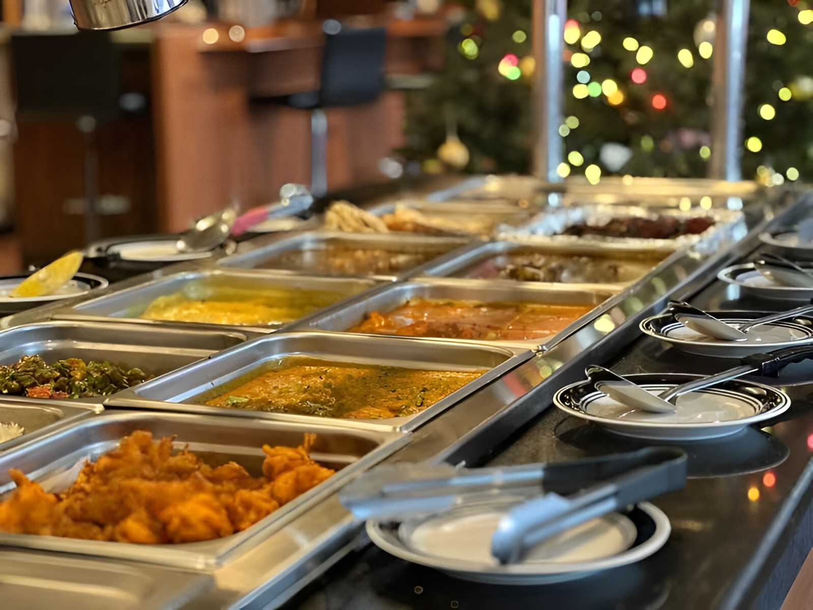 International Buffet Diverse global cuisines at a self - service spread at Captain Buffet, a Asian Fusion restaurant in Sacramento