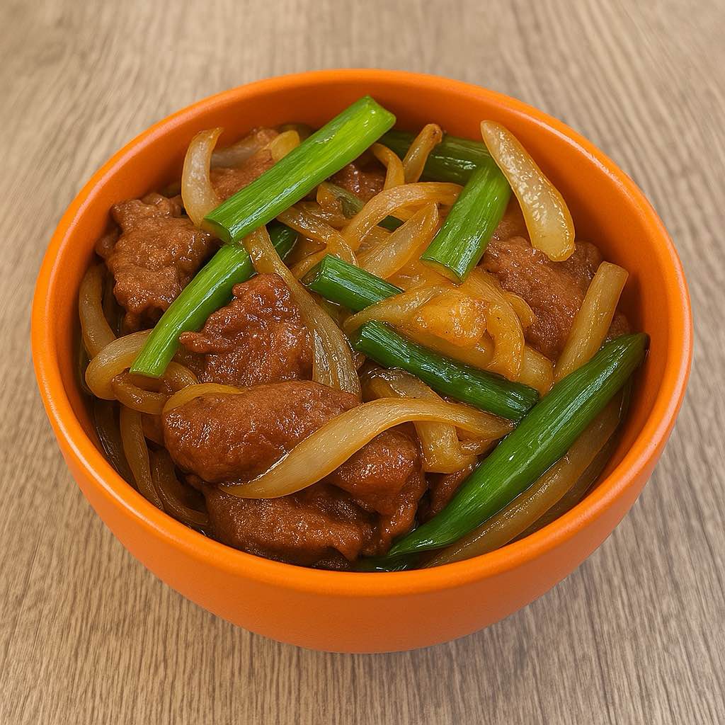 A bowl of mongolian beef, with tender beef in a savory sauce at Chop Chinese Food，a Chinese Restaurant in Los Angeles