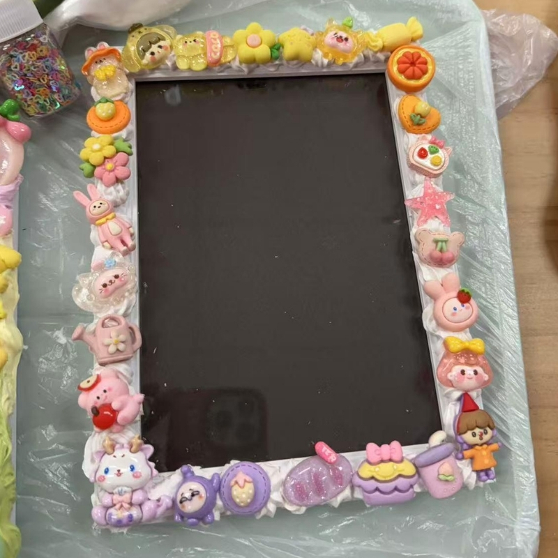 Pastel photo frame decorated with cute character charms at Cha Cha Boba Tea Shoppe, a Bubble tea store in Little Rock