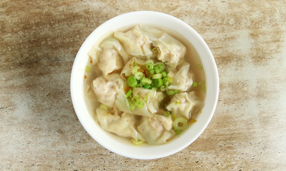 Wonton soup with pork dumplings, green onions, and clear broth at Chef Ben Asian Cuisine & Ramen, a Asian fusion restaurant in Friendswood