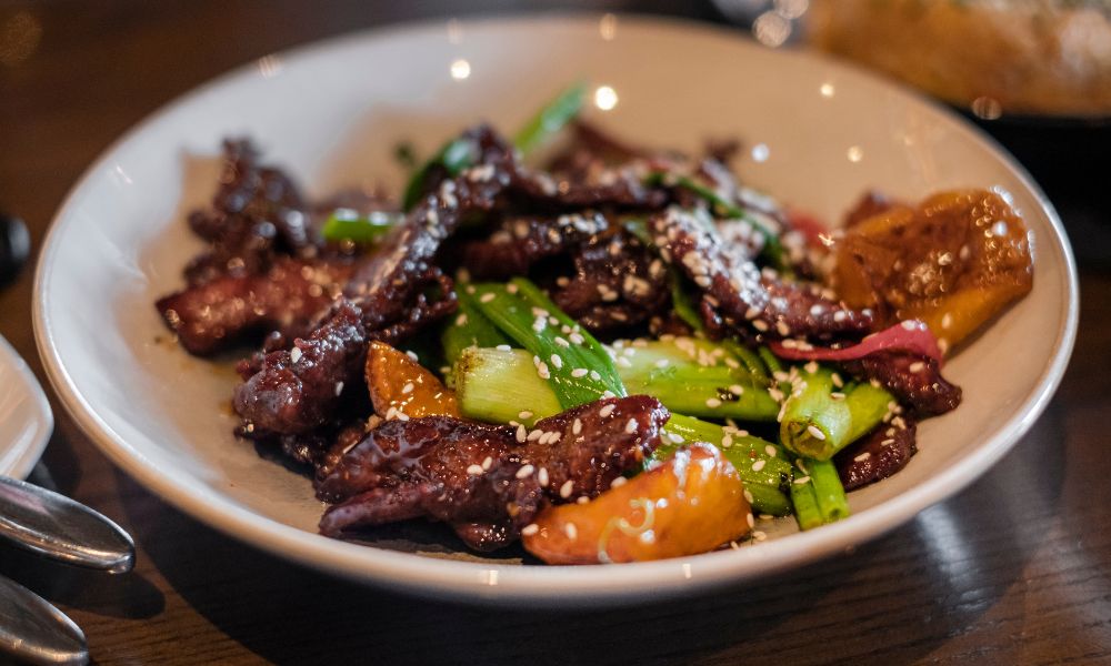 Sesame beef stir-fry with green onions and glazed sauce at Chef Ben Asian Cuisine & Ramen, a Asian fusion restaurant in Friendswood