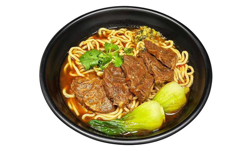Tender braised beef in rich broth with noodles, garnished with greens at Chef Ge, a Chinese Restaurant in Highland Park