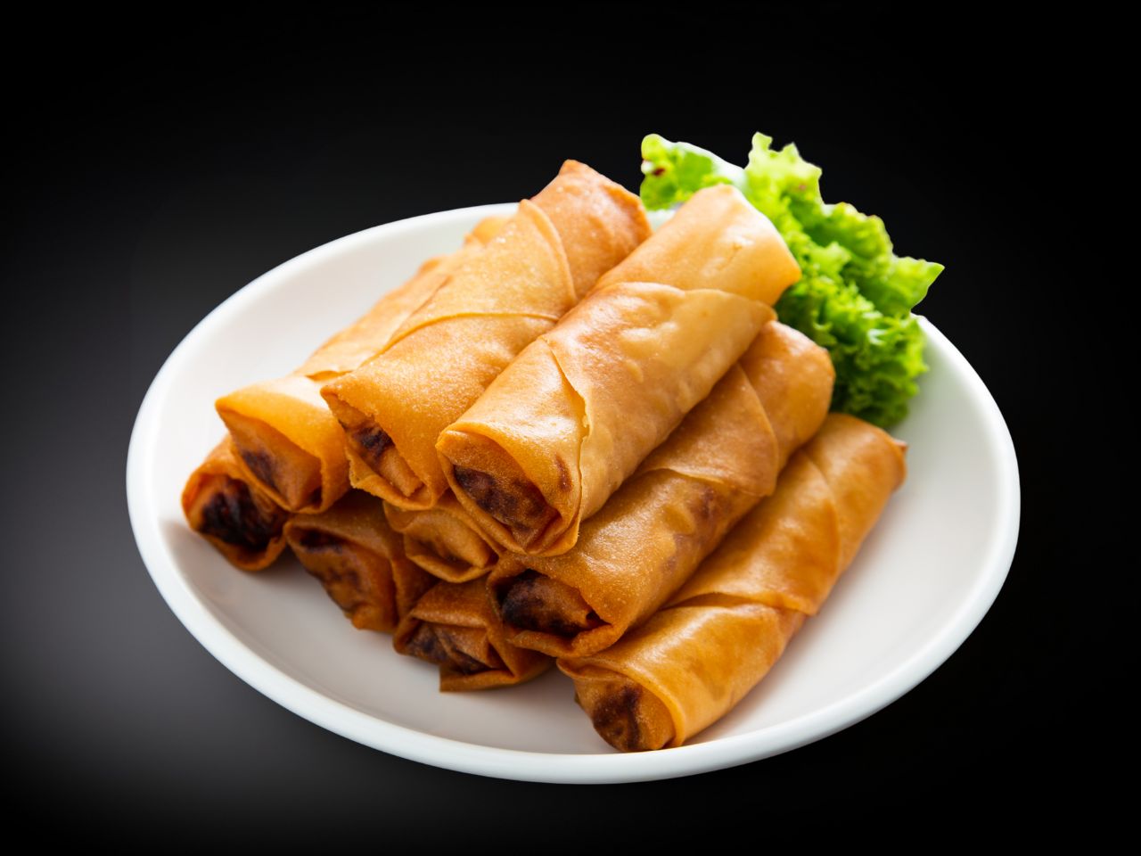 Crispy fried vegetable spring rolls served with lettuce at Chef Gong Chinese Restaurant in Lansing