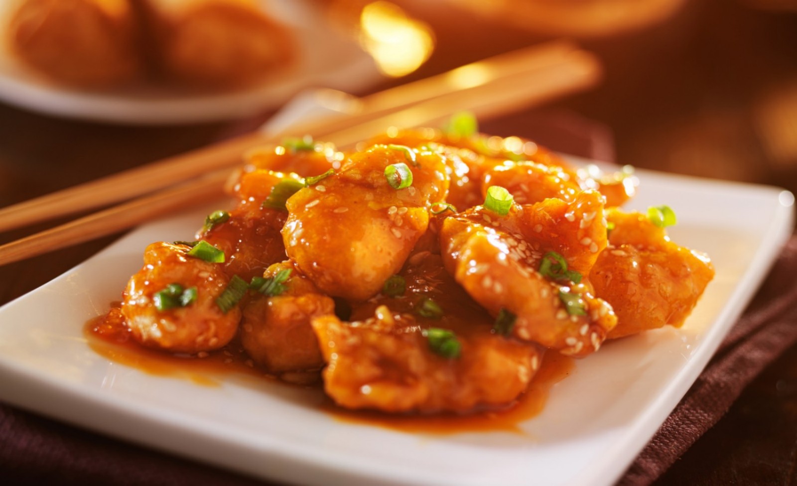 Sweet crispy chicken coated with sesame and green onion.