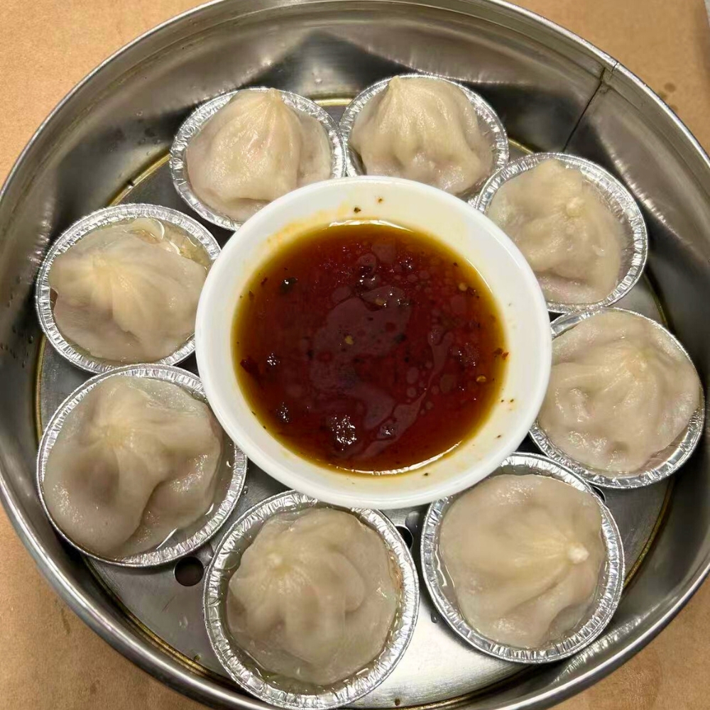 Chen's-Family-Dish-Six-Wok-&-Bar-Chinese-Restaurant-Soup-Dumplings-Salem Delicious soup dumplings with dipping sauce at Chen's Family Dish Six Wok & Bar, a Chinese Restaurant in Salem