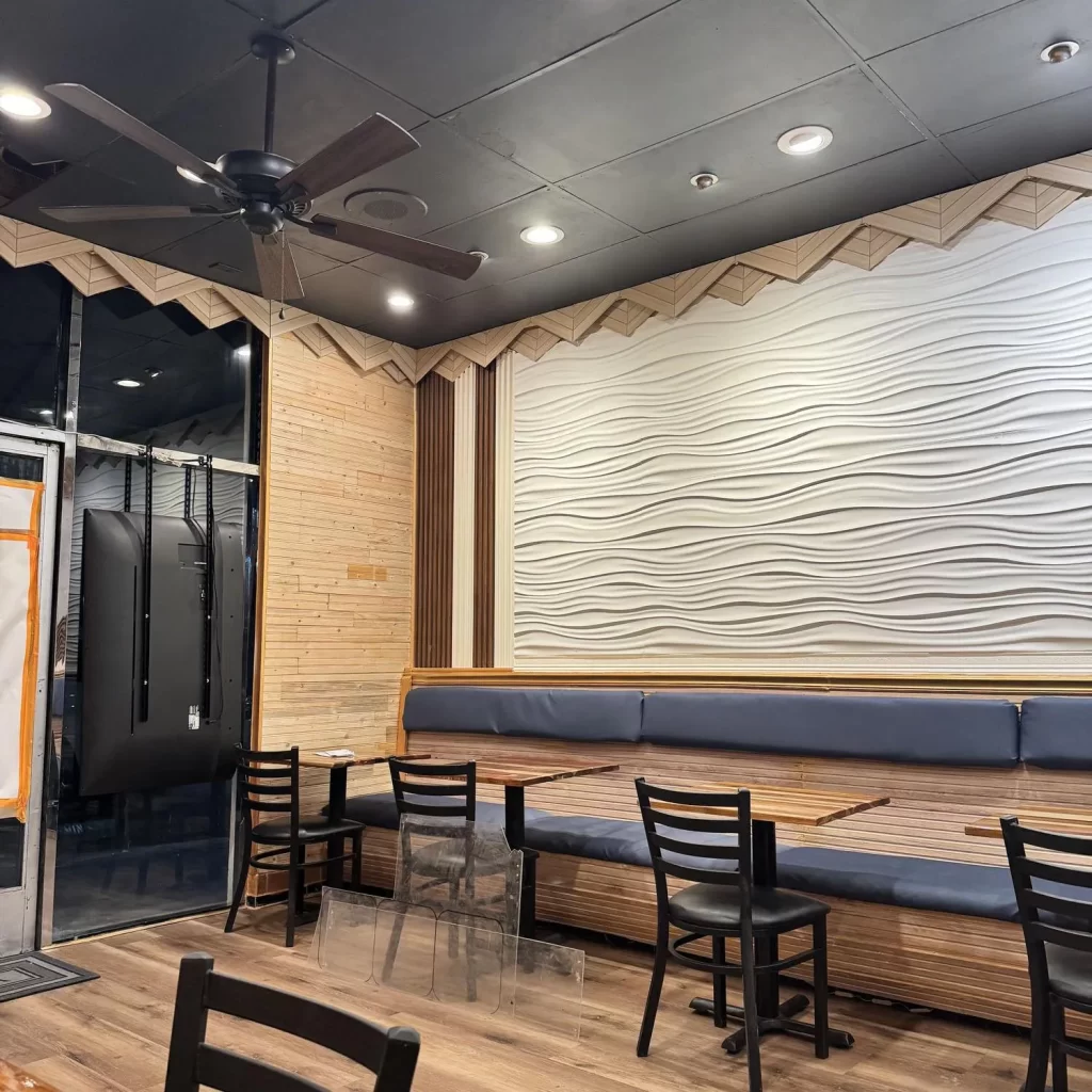 Cozy dining booths with modern wall design at Spicy Chinese Kitchen, a Chinese Restaurant in Torrance.