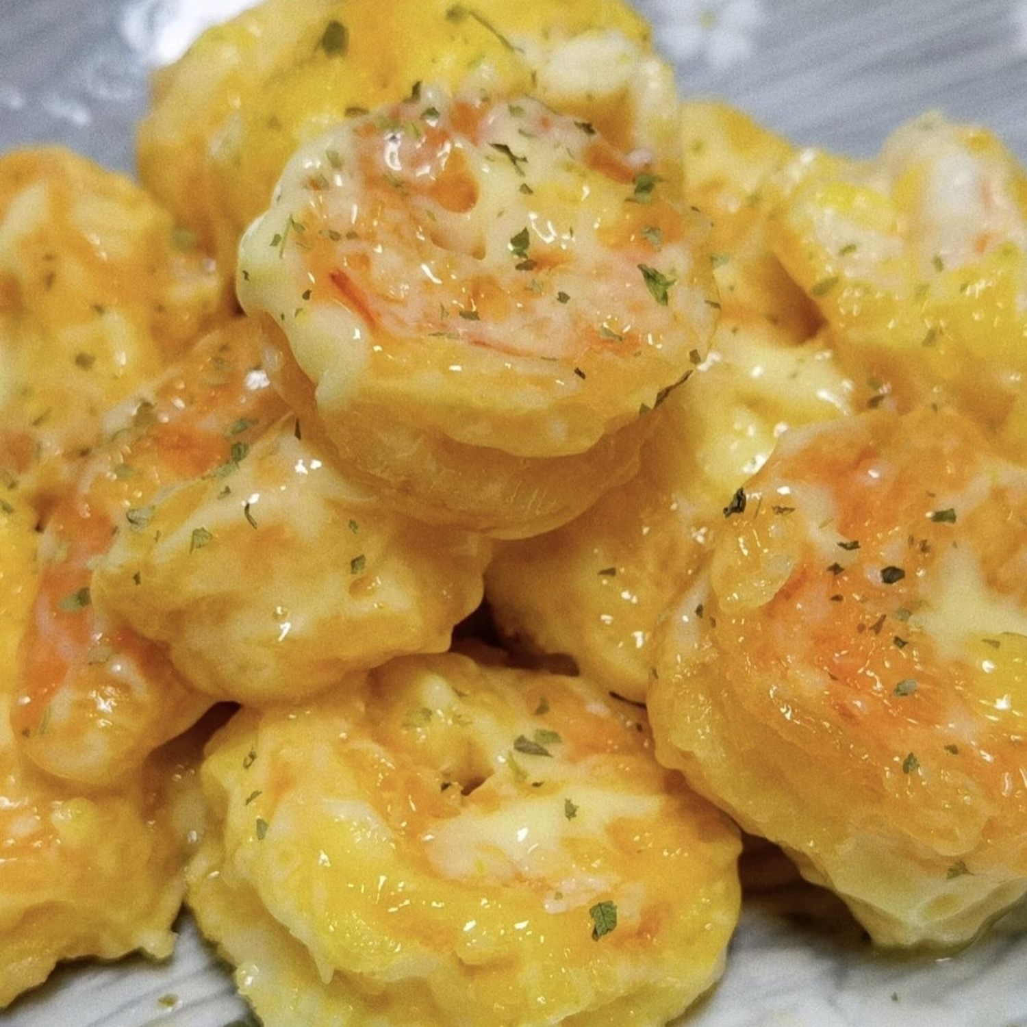 Creamy shrimp balls with savory sauce and herb flakes at Spicy Chinese Kitchen, a Chinese Restaurant in Torrance.