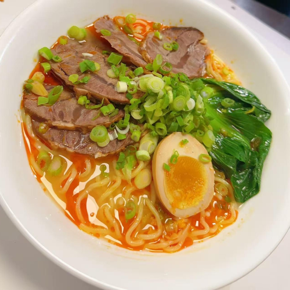 Beef noodle soup with egg and greens at Kung Fu Noodles, a Chinese Noodle Restaurant in Chilton