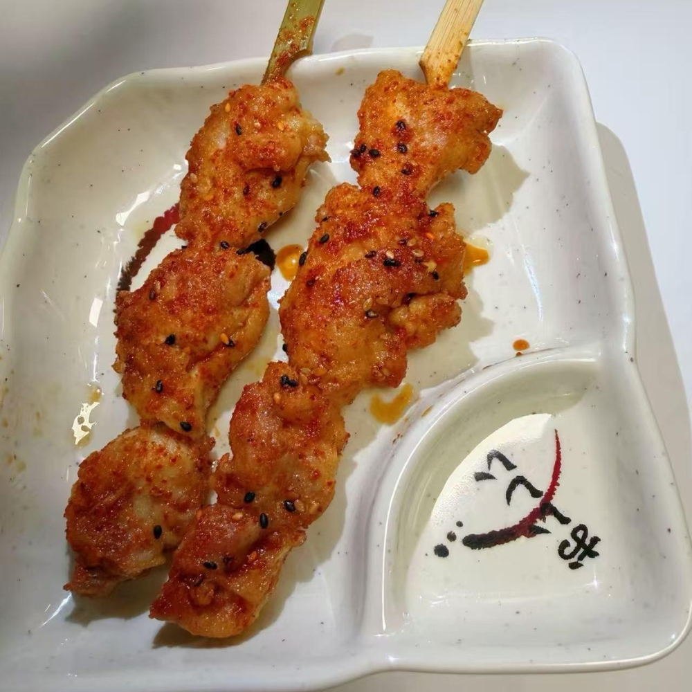 Spicy grilled chicken skewers at Kung Fu Noodles, a Chinese Noodle Restaurant in Chilton