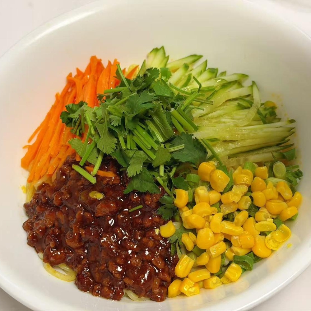 Zha Jiang Mian with fresh veggies and minced meat sauce at Kung Fu Noodles, a Chinese Noodle Restaurant in Chilton