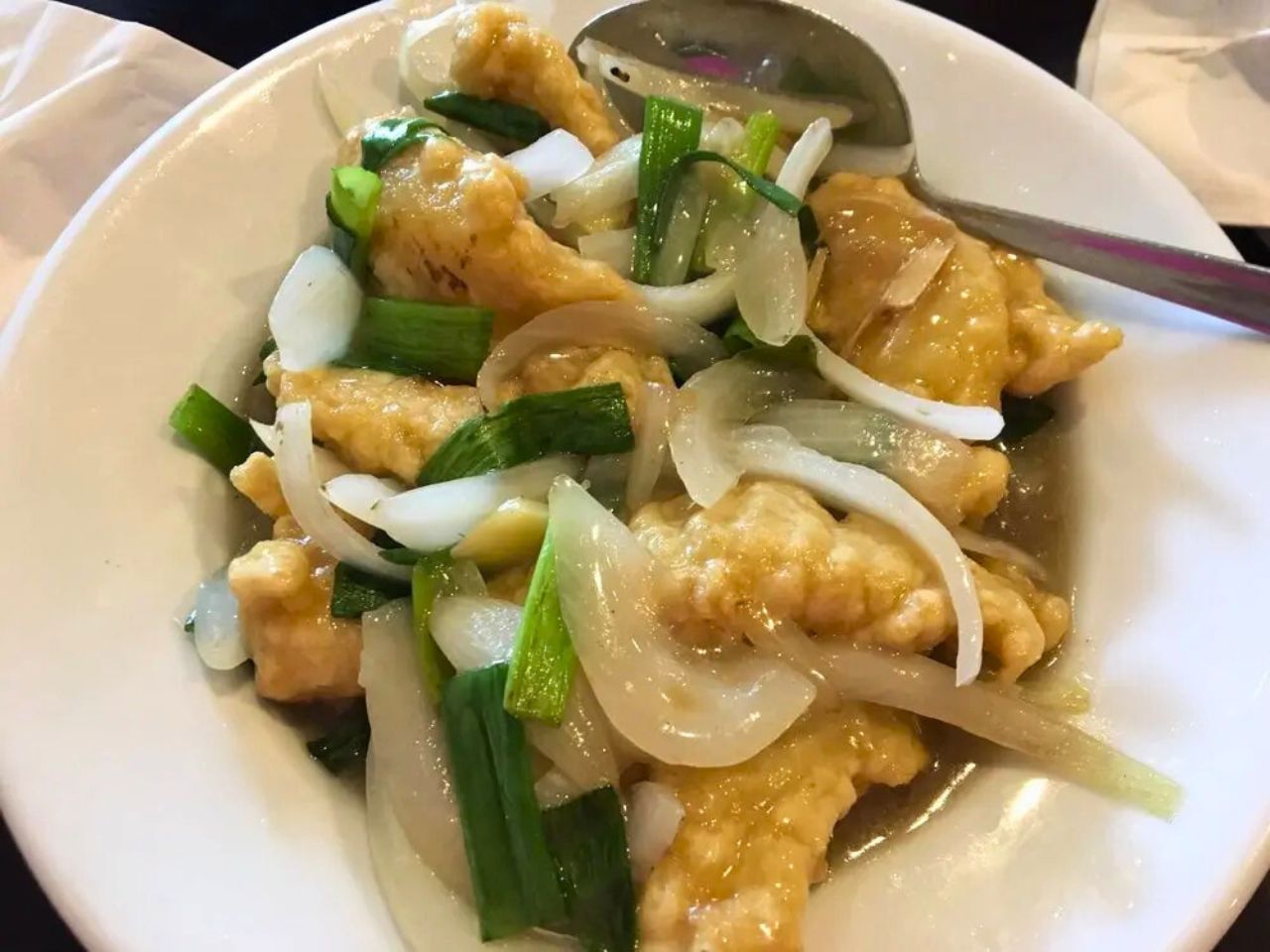 Scallion chicken with onion at China Cafe, a Chinese Restaurant in Manlius