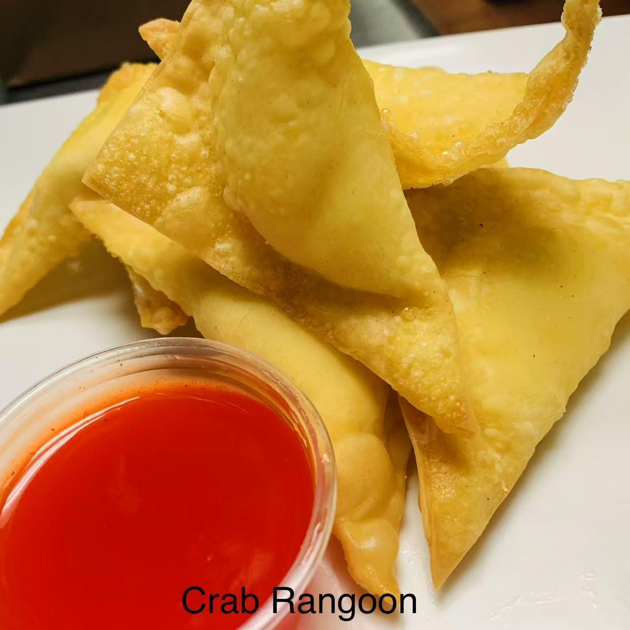 Fried crab rangoon with sweet and sour sauce at China Cook, a Chinese Restaurant in Owens Cross Roads