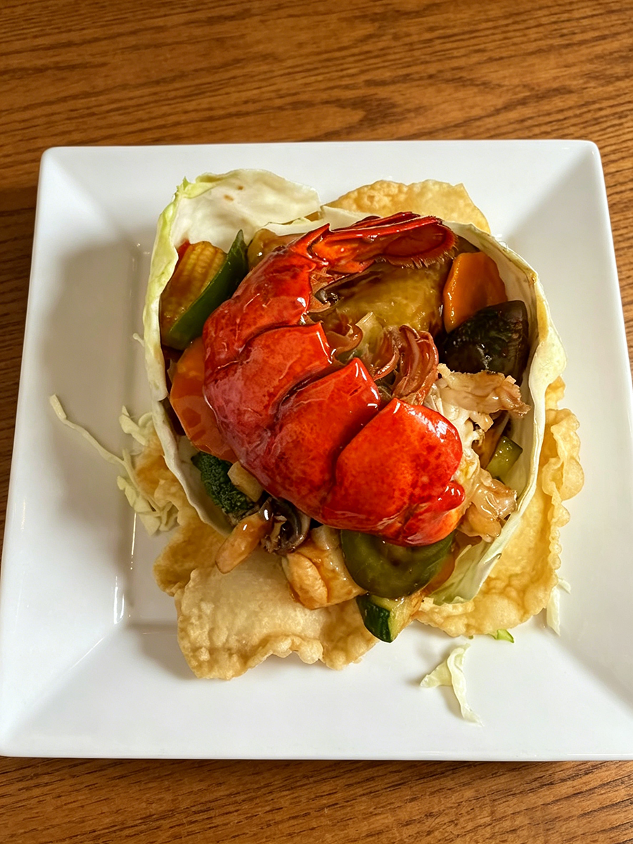 Lobster tail stir fry in crispy wonton cup at China Cottage, a Chinese Restaurant in Madison