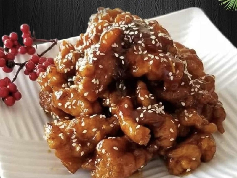 Honey-glazed pork with sesame seeds at China Flavor, a Dim Sum Restaurant in Lansing