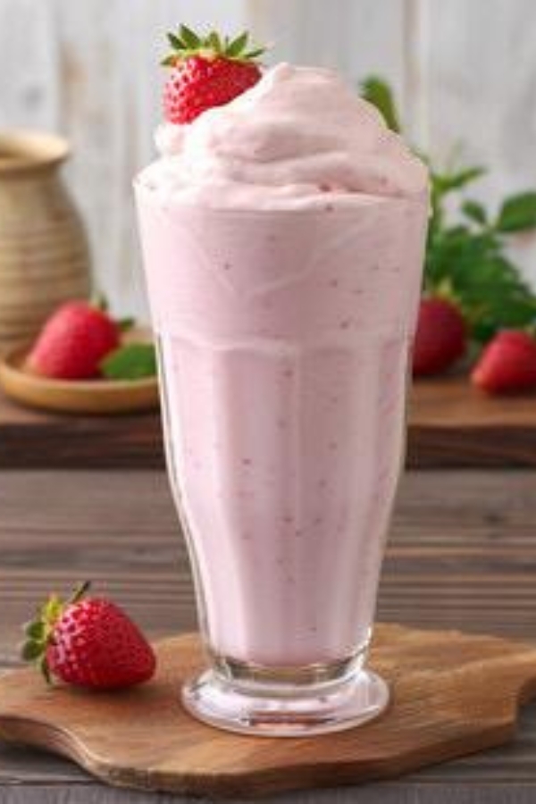 Pink strawberry smoothie topped with fruit at China Flavor, a Dim Sum Restaurant in Lansing
