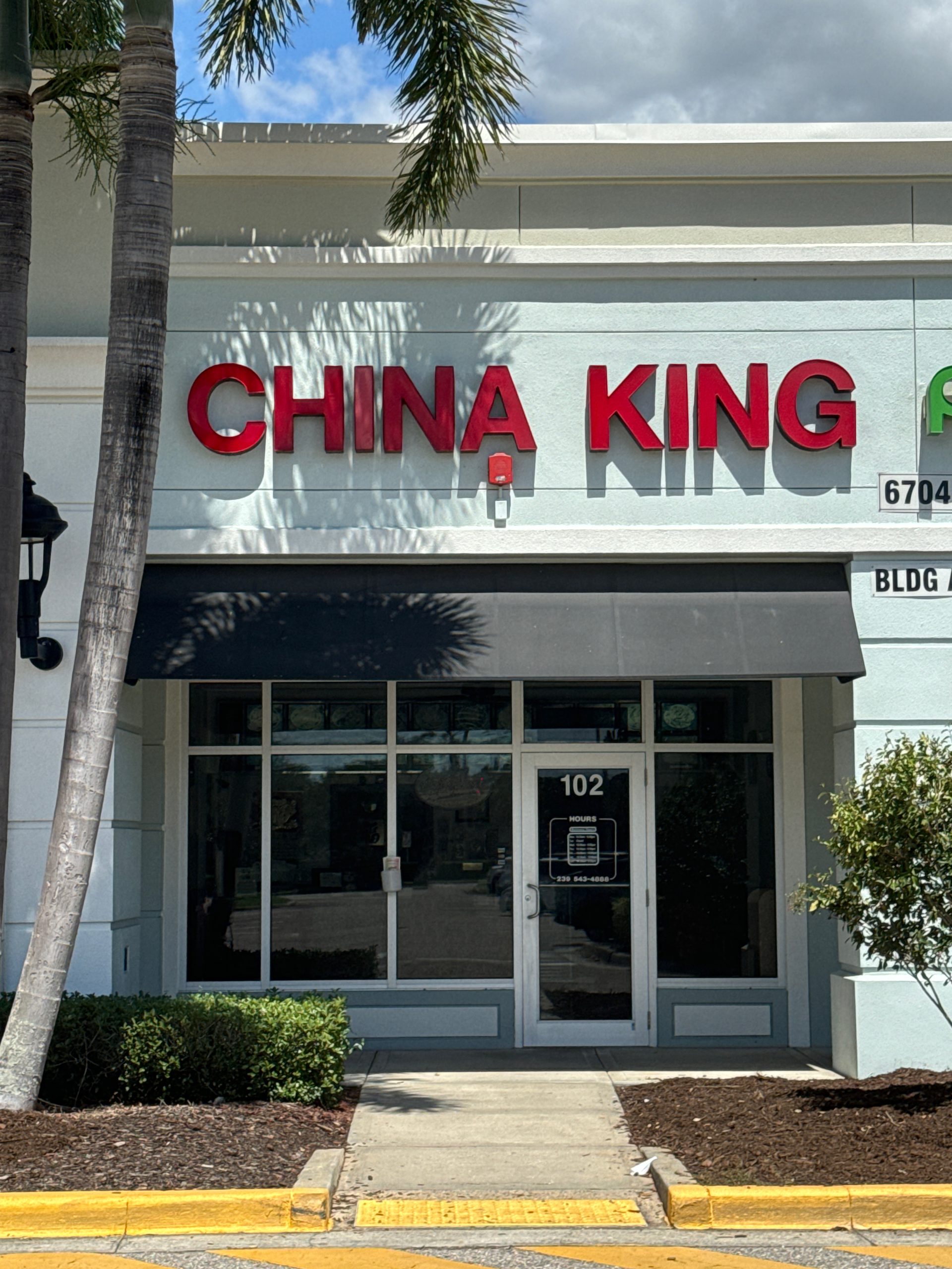 Exterior of China King Restaurant storefront with red signage at China King Restaurant, a Chinese Restaurant in North Fort Myers