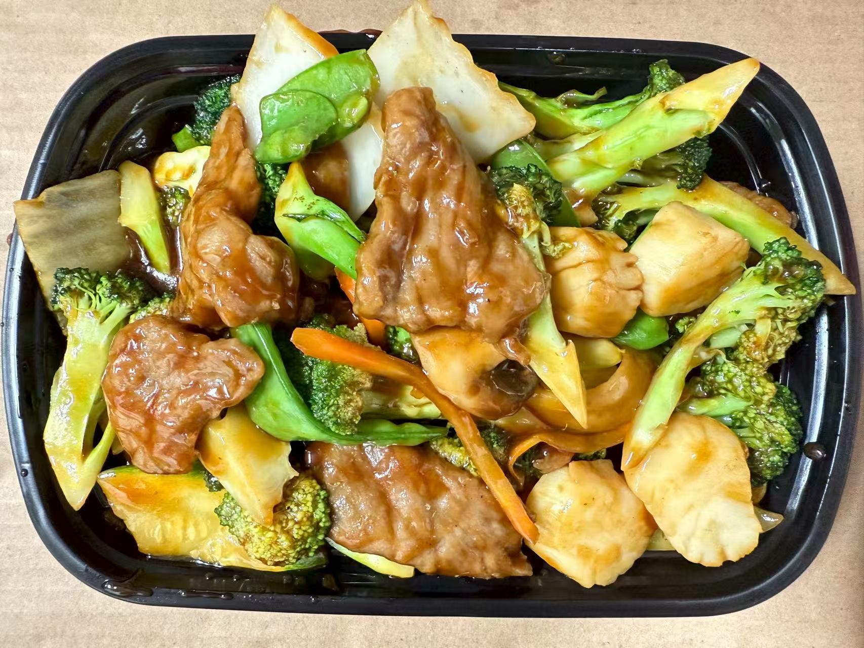 Beef, scallops and veggies in savory sauce at China one,a Chinese Restaurant in Whitsett