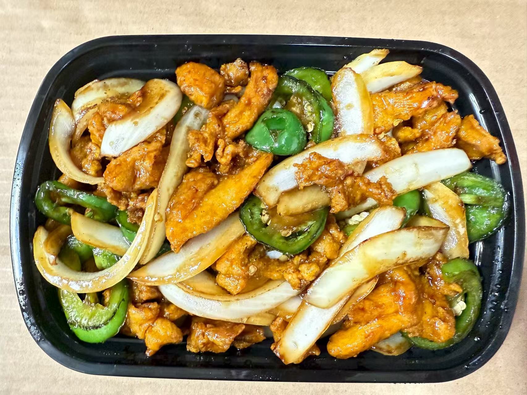 Chicken with jalapeños and onions in sauce at China one,a Chinese Restaurant in Whitsett