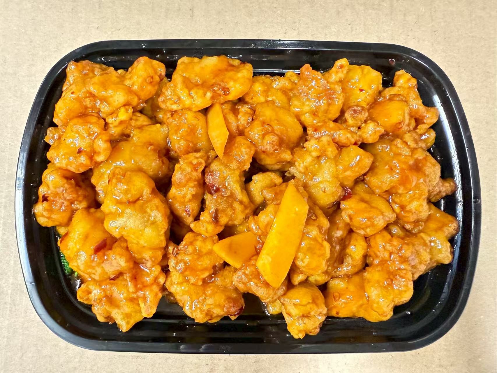 Chicken in orange - flavored sauce at China one,a Chinese Restaurant in Whitsett