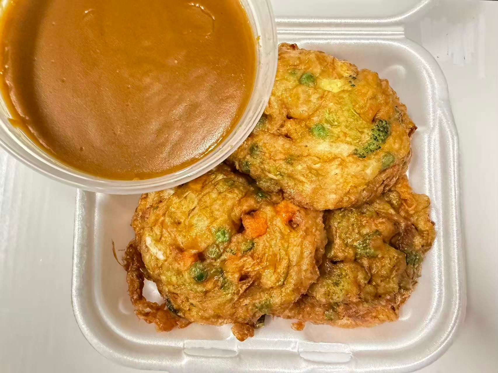 Veggie patties with brown sauce at China one,a Chinese Restaurant in Whitsett
