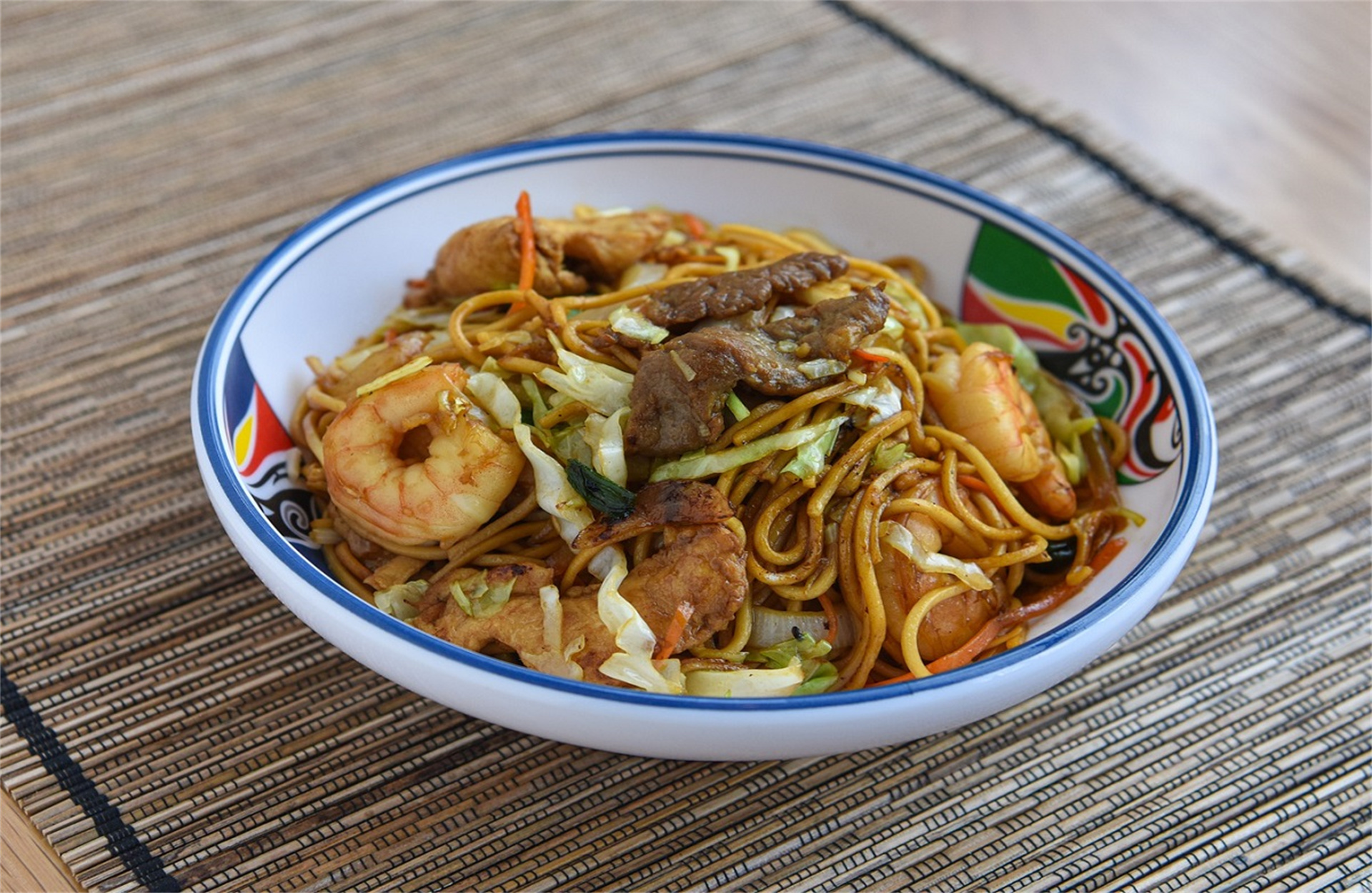 Combination chow mein with shrimp, beef and mixed vegetables