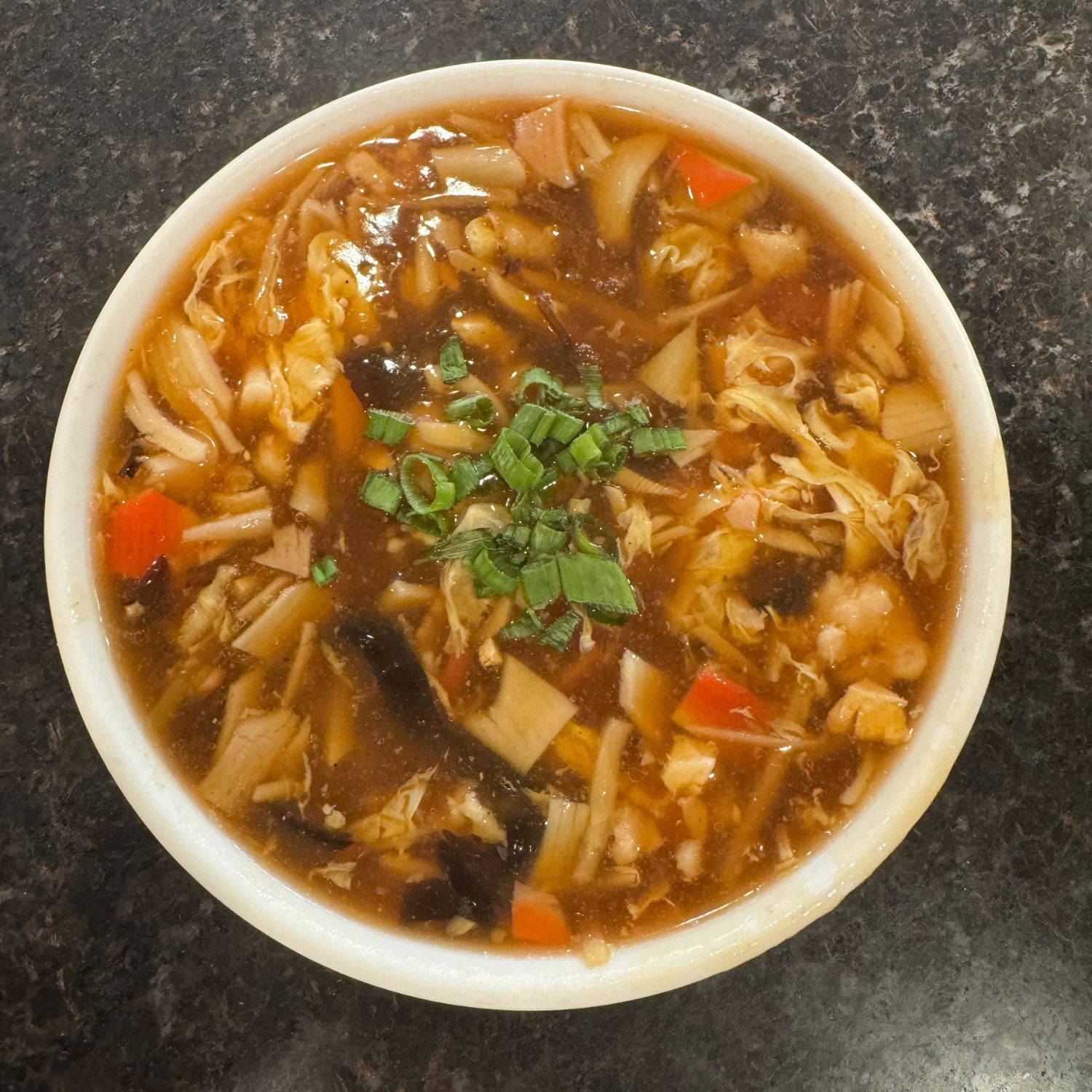 Classic hot and sour soup with tofu, wood ear mushrooms and eggs at China Palace Restaurant, a Chinese Restaurant in Milpitas