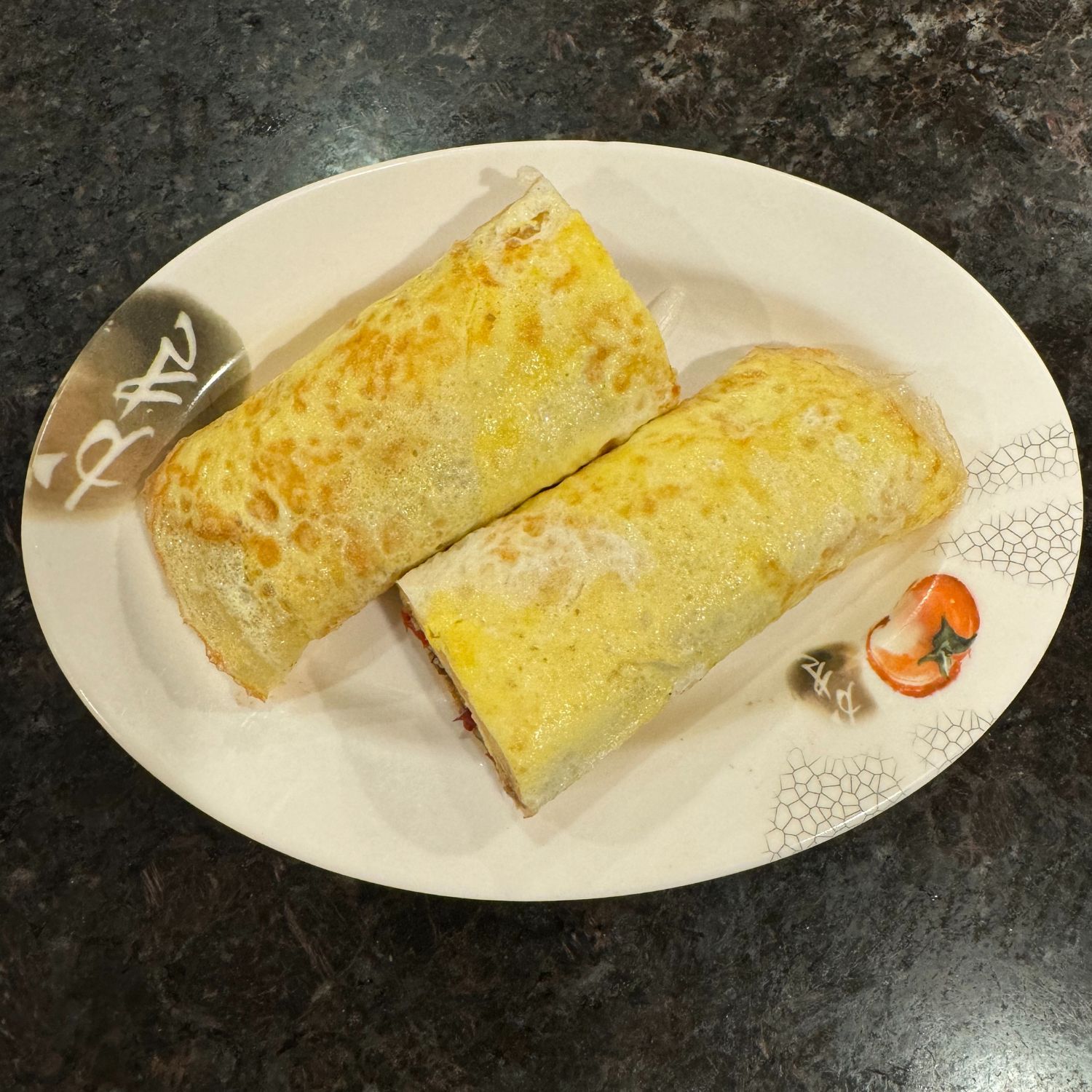 Soft egg wrap rolled with savory fillings, golden and fragrant at China Palace Restaurant, a Chinese Restaurant in Milpitas