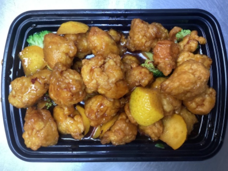 Orange chicken with orange slices at China Panda, an Chinese Restaurant in Dallas