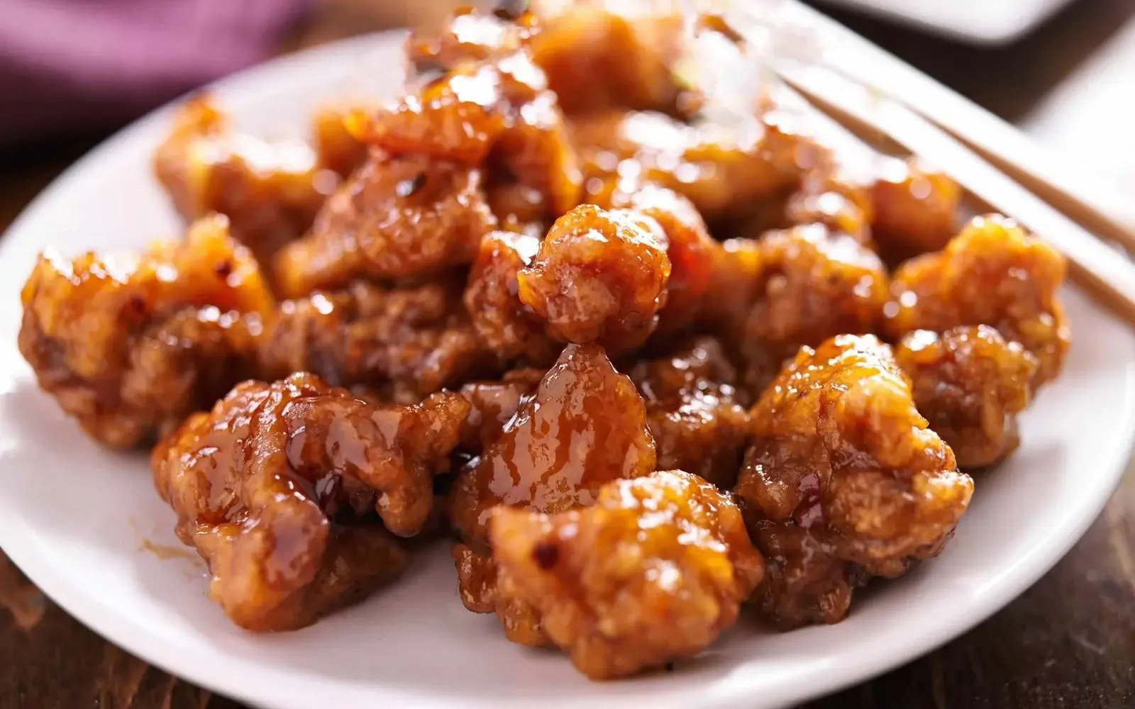 Chinatown-Chinese-Restaurant-General-Tso's-chicken-Griffith General Tso's chicken, pieces coated with rich sauce, bright red color, neatly arranged at Chinatown Chinese Restaurant, a Chinese Restaurant in Griffith