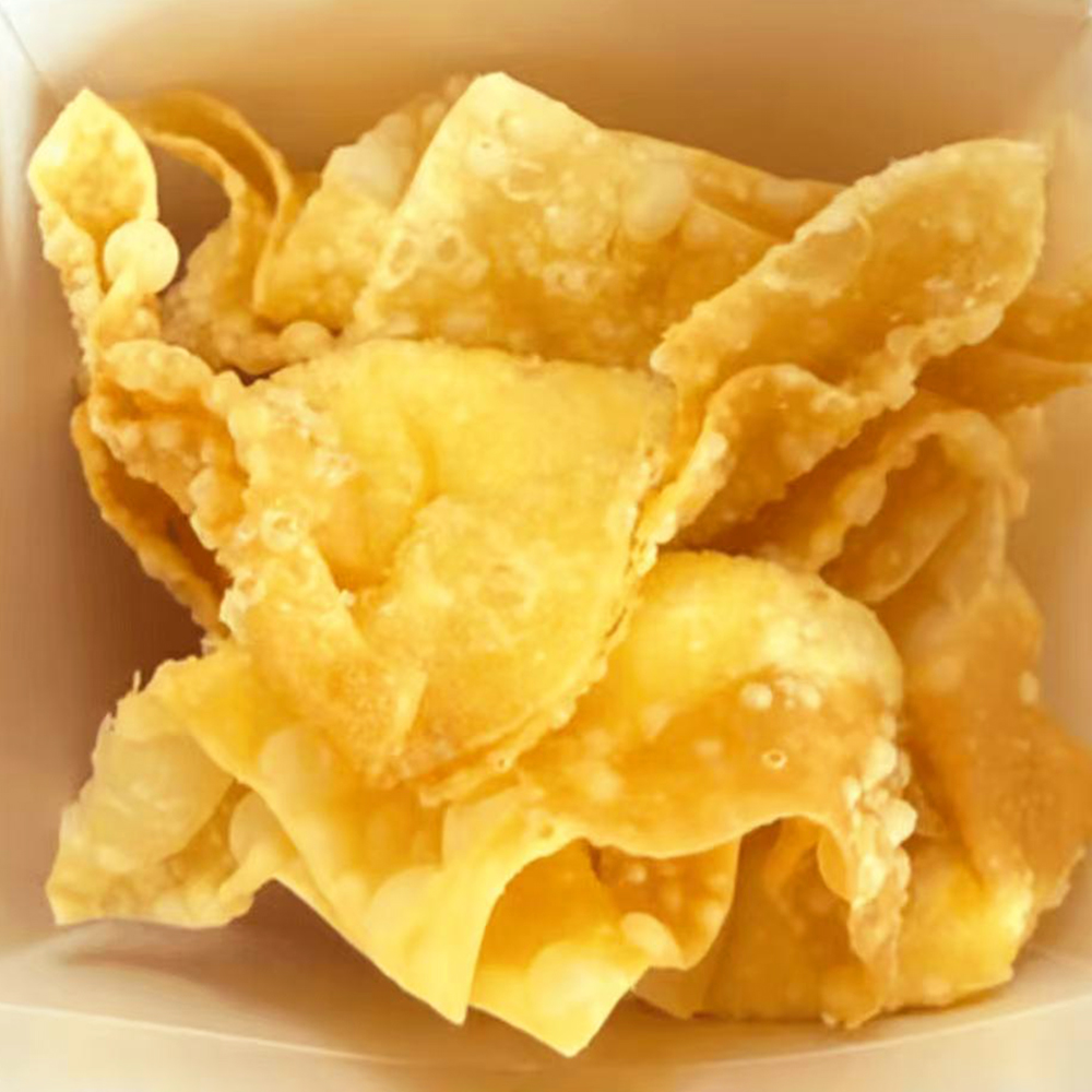 Crispy wontons filled with cream cheese and imitation crabmeat, typically mixed with green onions at China Wok，a Chinese Restaurant in Bangor