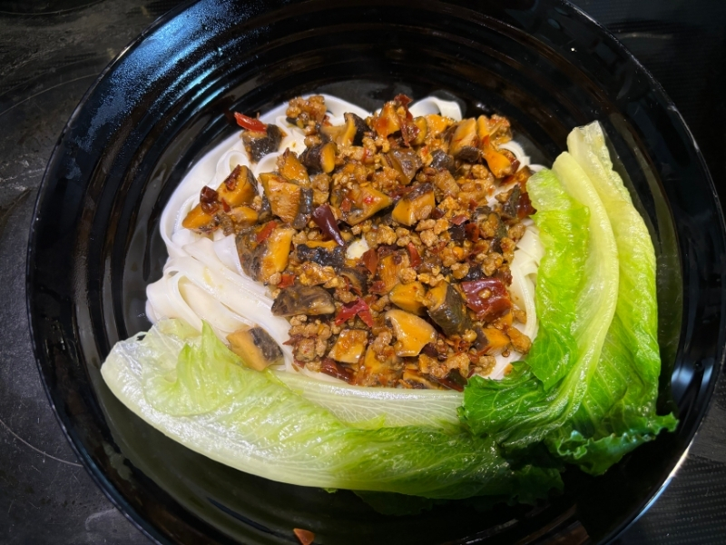 Noodles with mushroom mince and greens at Noodle Time, a Chinese Restaurant in Flushing