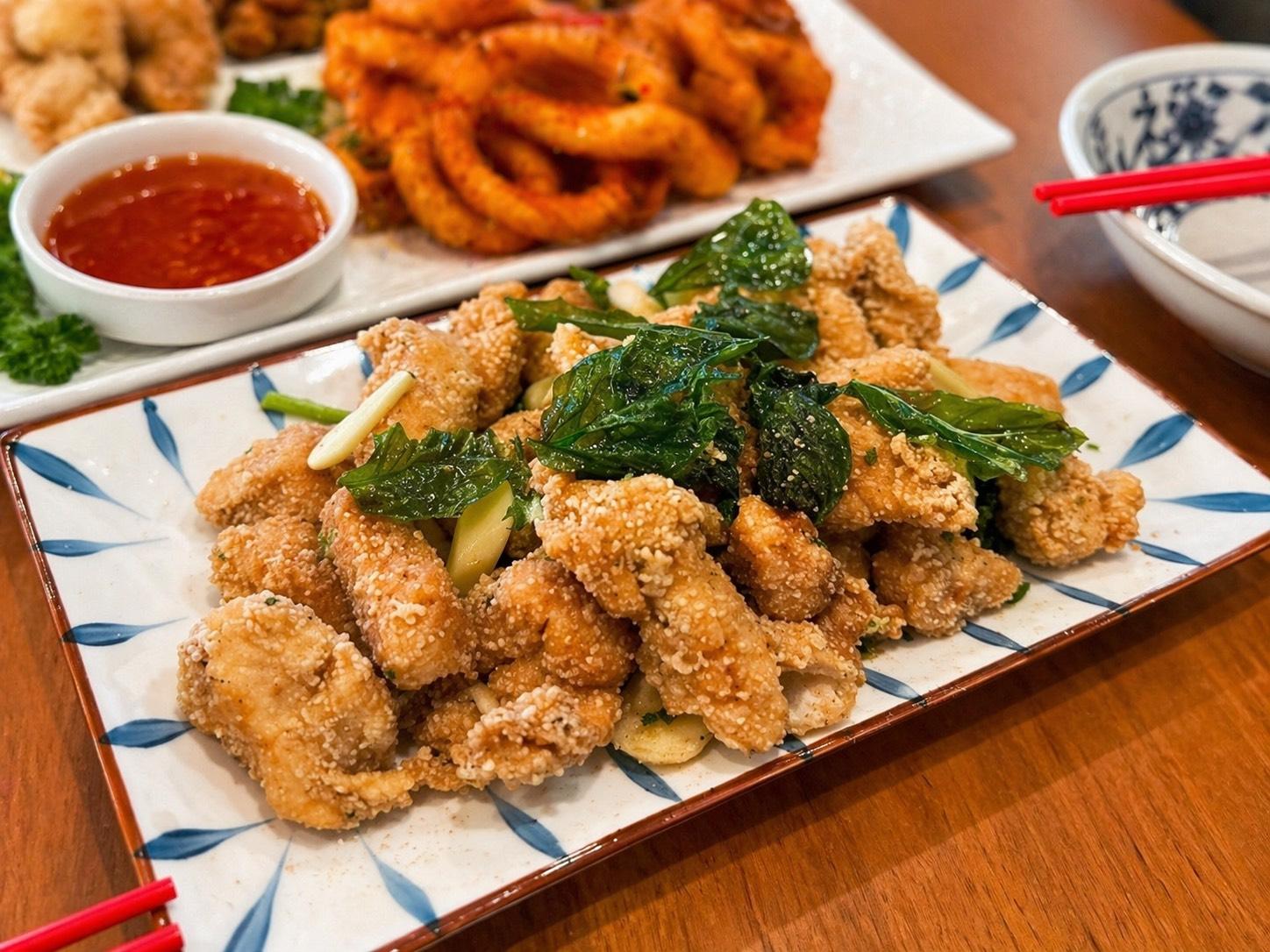 Crispy fried chicken with basil leaves at Chop Bento, a Asian Restaurant in Oxford