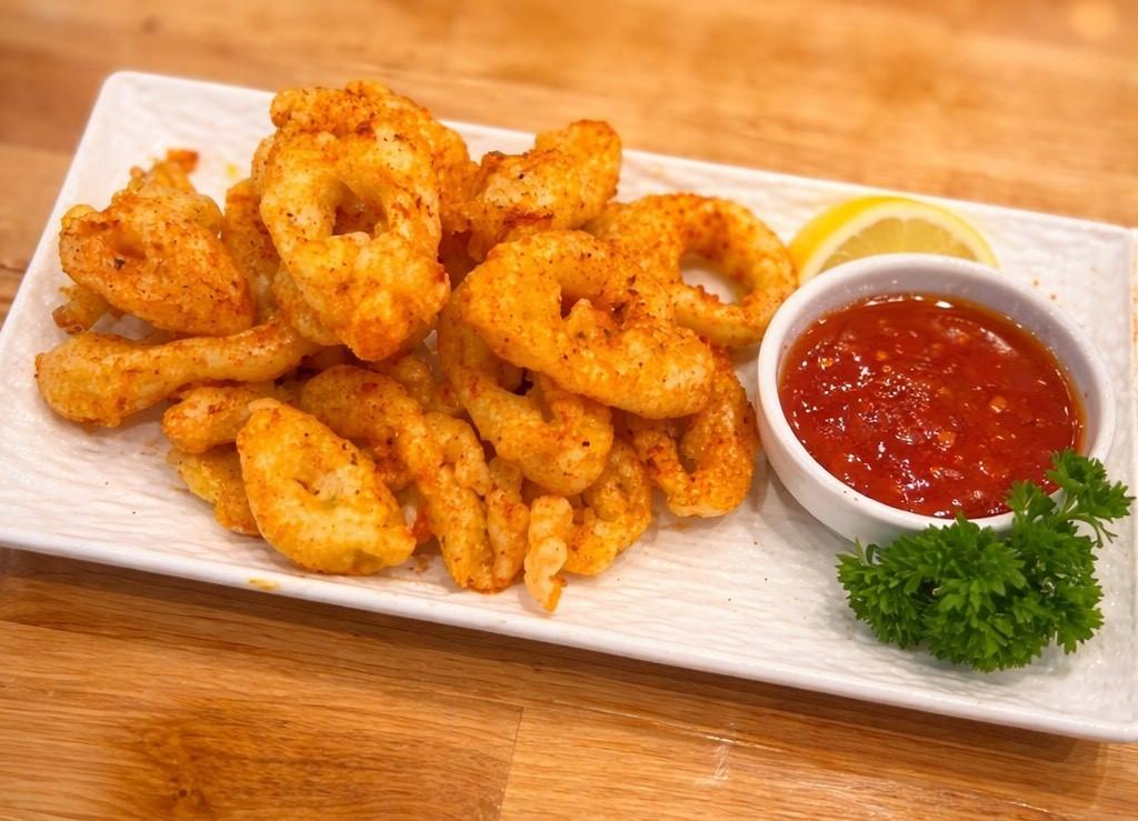 Fried calamari rings with spicy sauce and lemon at Chop Bento, a Asian Restaurant in Oxford