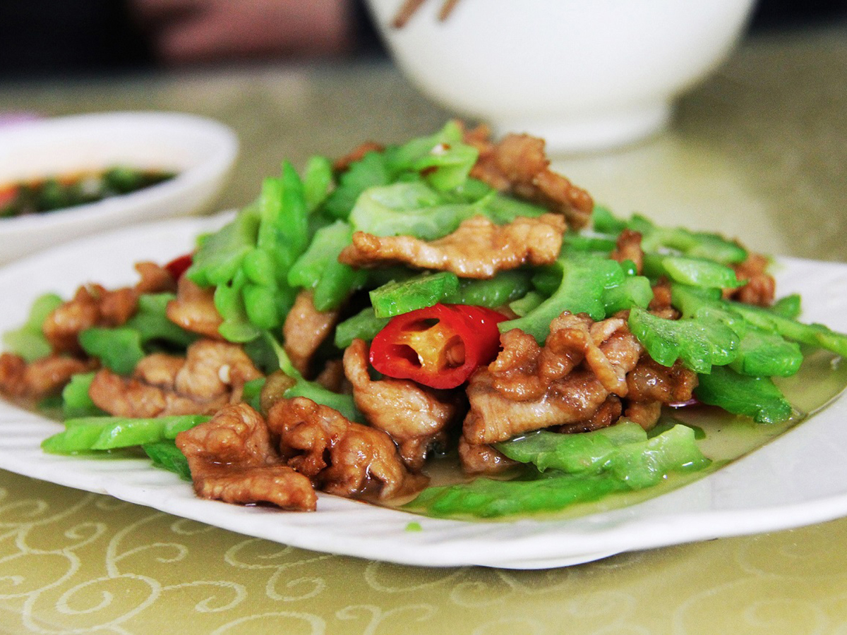 Bitter melon stir - fried with tender pork slices at Chopjoy, a Chinese Restaurant in Los Angeles