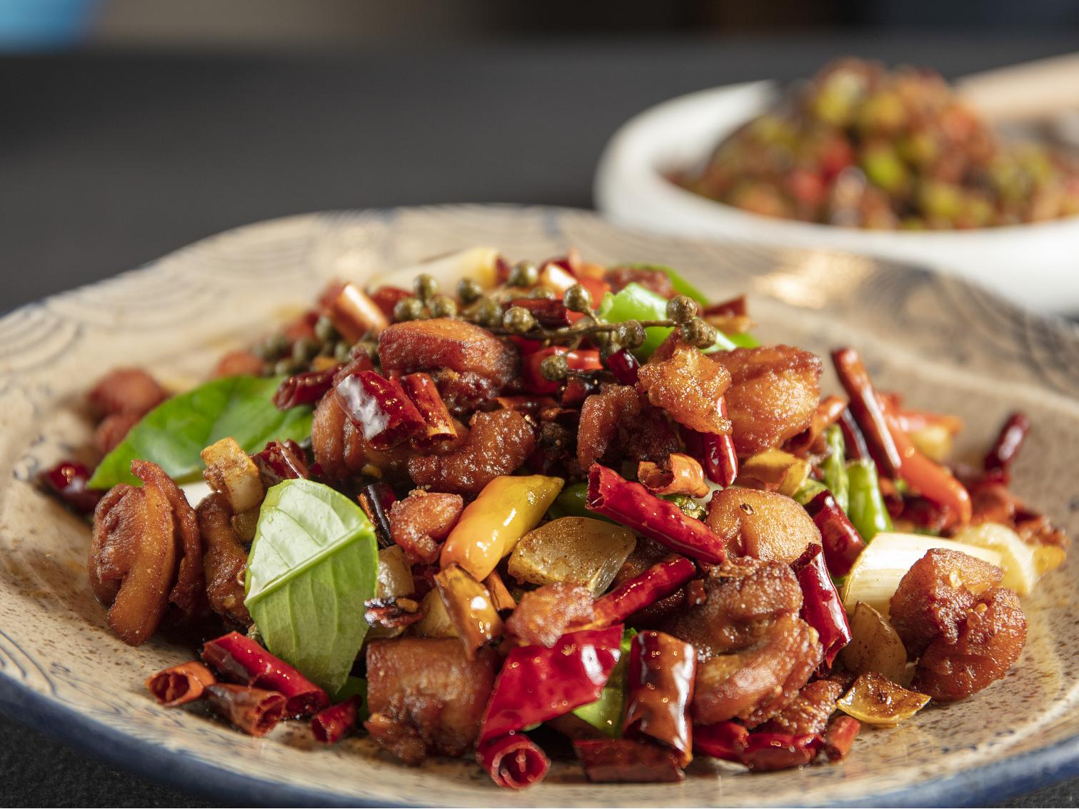 Spicy stir - fried chicken with chilies and peppers at Chopjoy, a Chinese Restaurant in Los Angeles