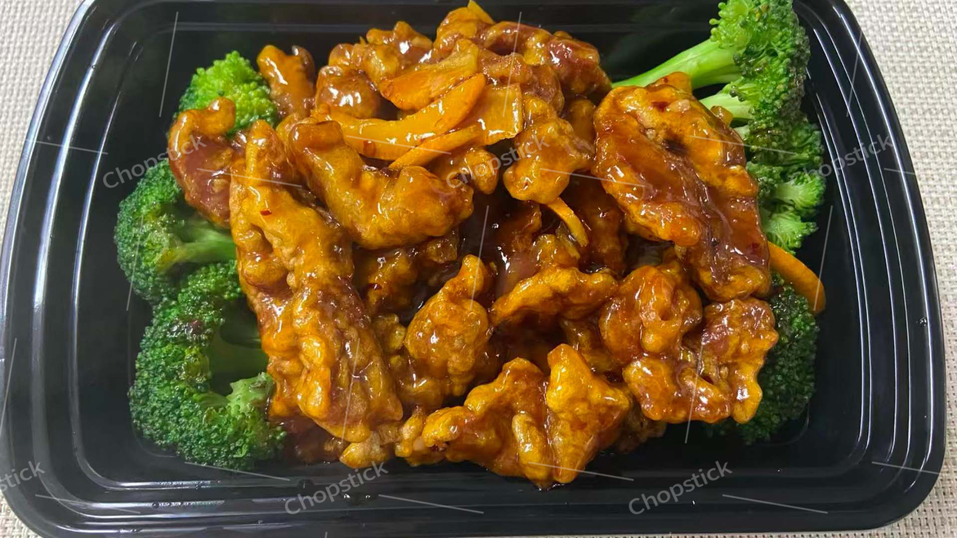Orange flavor beef with broccoli in takeout container at Chopstick, a Chinese Restaurant in Flowood