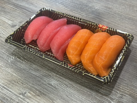 Assorted tuna and salmon nigiri at Chop Sushi & Grill, a Japanese Restaurant in Los Angeles