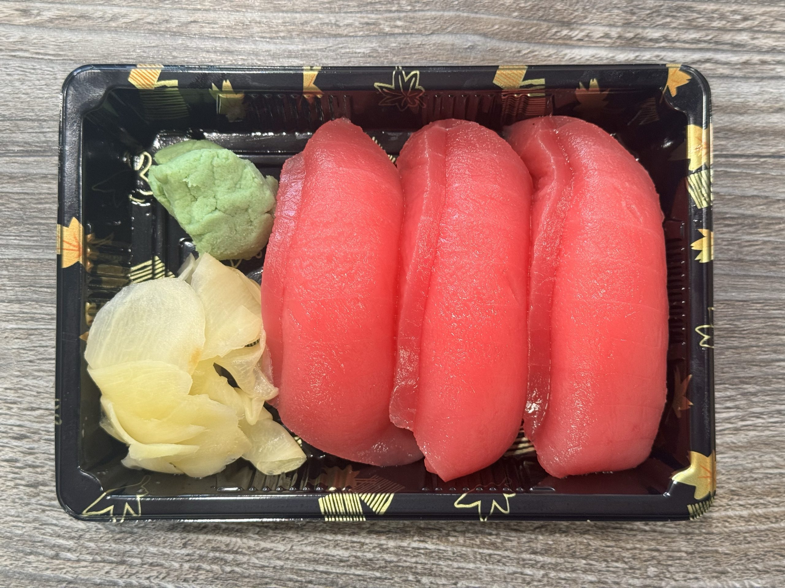Fresh tuna nigiri with wasabi and ginger at Chop Sushi & Grill, a Japanese Restaurant in Los Angeles