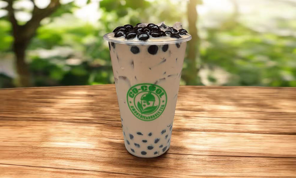 Creamy signature bubble tea with black pearls and ice at Co-cool Smoothie & Bubble Tea, a Bubble Tea Shop in Freehold