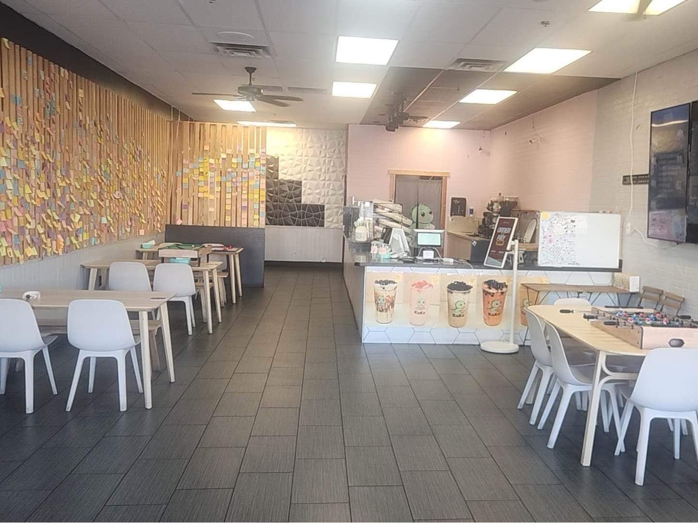 Koko-Boba-Tea-Greenway-Bubble-Tea-Store-Dining-Area-Scottsdale Dining area with sticky note wall at Koko Boba Tea Greenway, a Bubble Tea Store in Scottsdale