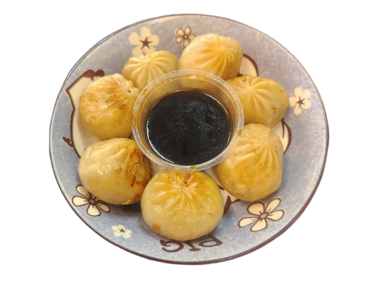 Soup dumplings with dipping sauce at Koko Boba Tea Greenway, a Bubble Tea Store in Scottsdale