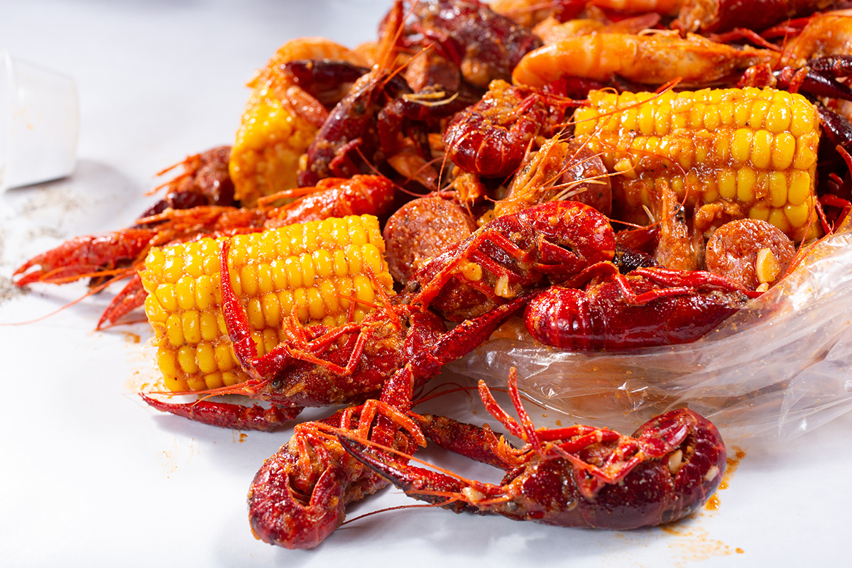 Spicy crawfish boil with corn sausage and shrimp at Crabbers No.12, a Seafood Restaurant in Orlando
