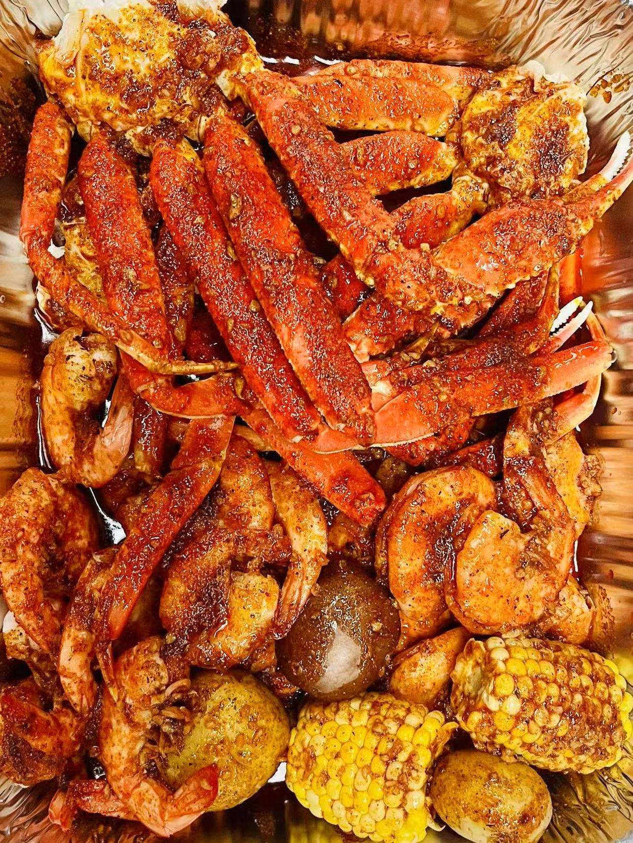 Crab, shrimp, corn, and potatoes seasoned and cooked at Crabbers, a Seafood restaurant in Sarasota