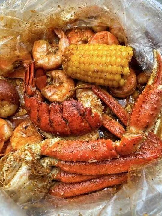 A mix of shrimp, lobster, crab, and corn at Crabbers, a Seafood restaurant in Sarasota