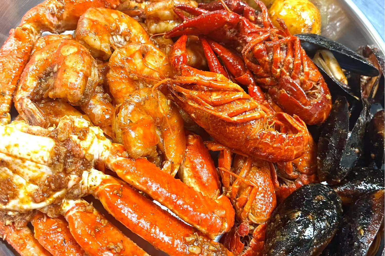 Crayfish, crab, mussels, and shrimp cooked in a spicy sauce at Crabbers, a Seafood restaurant in Sarasota