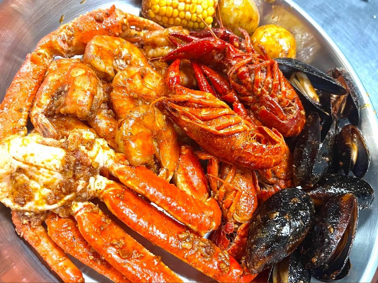 Mixed seafood platter with crab, shrimp, crawfish and mussels at Crabbers, a Seafood Restaurant in Saint Petersburg