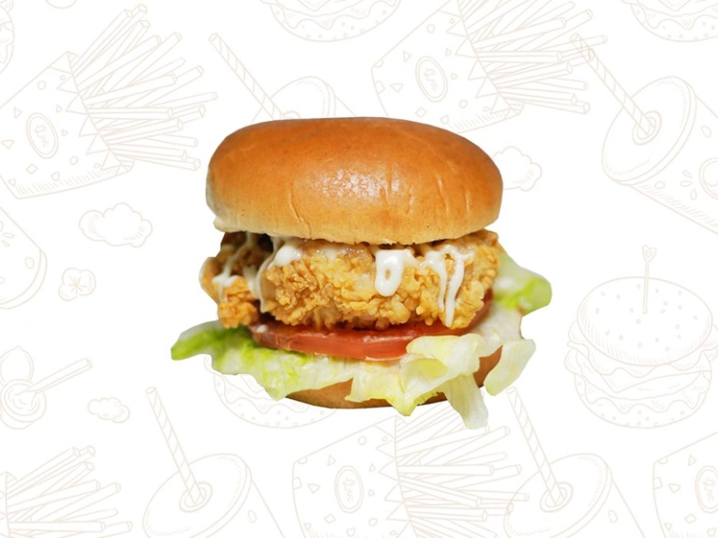 Chicken tender burger with lettuce and tomato at Crispy Burger, a Fast - Food Restaurant in Cut Off